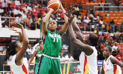 ON TARGET: D'Tigress foward, Adaora Elonu shoots during the match against Guinea yesterday.