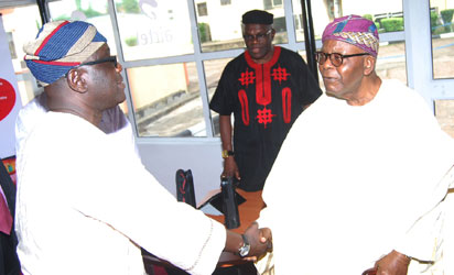 Left Mr Gbenga Adefaye G M '\ Editor in Chief Vanguard with Sir Olanihun Ajayi and Mr Yanju Adegbite centre at the ceremony .