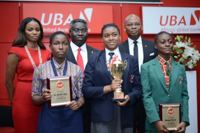 Overall Winner of the UBA Foundation National Essay Competition for secondary schools, Miss Emediong Uduak Uko of British Nigerian Academy, Abuja (middle) flanked by 2nd prize winner Miss Enonuoya Starish of Lagoon School Lagos (right) and 3rd prize winner Miss Eze Ugochinyere Golden of Living World Academy Aba, during the Grand finale and prize giving ceremony held at UBA House in Lagos