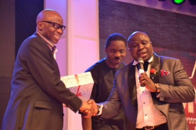 Gov. Olusegun Mimiko of Ondo State with Seun Oloketuyi and Gbenga Adeyinka at the event