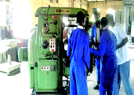Students of Federal Science and Technical College, Yaba in one of their engineering workshops during a hands-on training