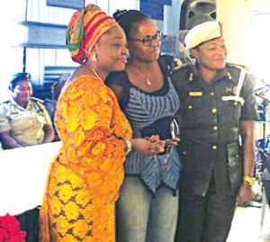 From L-R: Hon Lola Akande, the Lagos State Commissioner for Women Affairs and Poverty  Alleviation, an inmate who presented a beautiful neck bead to the Commissioner and the Deputy Controller of Prisons in charge of the female prison, Mrs. Ekpendu M. Lizzie