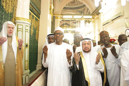  President Buhari at Prophet Muhammad's Mosque in Medina to commence the lesser Hajj, Umrah. With him is the NSA, Maj-Gen, Babagana Monguno (retd) 