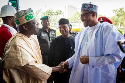 Bola Tinubu Colloquium -President Buhari being received by Chief Bola Ahmed Tinubu and Vice President Yemi Osinbajo as President Buhari attends the 8th Bola Tinubu Colloquium at the International Conference Centre Abuja on 29th March 2016