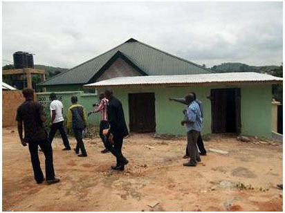 University officials taking journalists around.