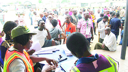 VOTERS WAITING TO CAST THEIR VOTE AT UNIT 6 WARD 5 .DURING THE NATIONAL AND STATE ASSEMBLIES RERUN ELECTION AT UNIT 5 WARD12 AT PORT HARCOURT CITY GOVERNMENT AREA IN RIVERS STATE ON 19/03/16