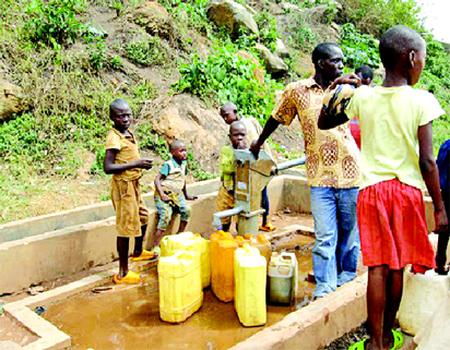 Children queueing for potable water