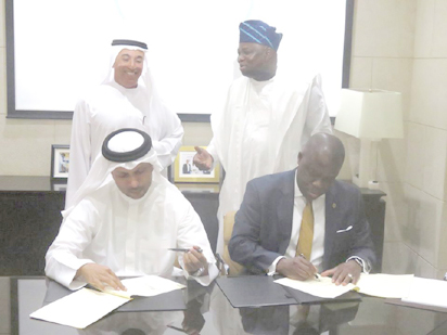 The Lagos State Attorney General and Commissioner of Justice, Mr. Adeniji Kazeem and the Chief Executive Officer of Smart City Dubai LLC, Mr. Jabber Bin Hafez,  signing the MoU for the Lagos Smart City, at the Emirate Towers, in the presence of the Chairman of Dubai Holdings and Deputy Prime Minister, His Excellency, Ahmad Bin Byat and Governor Akinwunmi Ambode of Lagos State.
