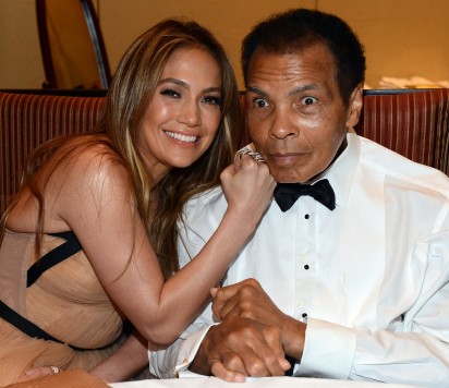 (FILES) This file photo taken on March 22, 2013 shows Singer Jennifer Lopez and boxer Muhammad Ali attending Muhammad Ali's Celebrity Fight Night XIX at JW Marriott Desert Ridge Resort & Spa in Phoenix, Arizona. Boxing icon Muhammad Ali died on Friday, June 3, a family spokesman said in a statement. "After a 32-year battle with Parkinsons disease, Muhammad Ali has passed away at the age of 74," spokesman Bob Gunnell said. / AFP PHOTO