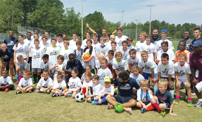Kids that attended the summer soccer camp at USC with the coaches.