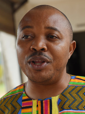 Idia Renaissance NGO Project coordinator Rowland Nwoha speaks in Benin-city, Edo State, Nigeria, on October 21, 2016. In 2015, 153,000 migrants arrived in the European Union via the Italian coast, according to the International Organization for Migration. The largest number -- about 22,000 -- were Nigerians. In May last year, Brussels opened talks with Abuja to make "readmission agreements" easier and oblige Nigeria to take back its nationals. Idia Renaissance NGO is focused to combat human trafficking, prostitution, HIV/AIDS and other anti-social vices through advocacy, information, counselling and education. / AFP PHOTO