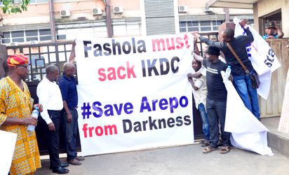 Arepo residents in Ogun state, in protest over three months power outage at Ikeja Electricity Distribution Company (IKEDC), Head Office in Alausa, Ikeja, Lagos, Monday. PHOTO;AKEEM SALAU
