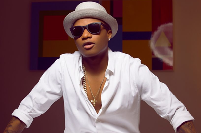 Image result for Wizkid reacts to baby mamaâ€™s banging bikini body