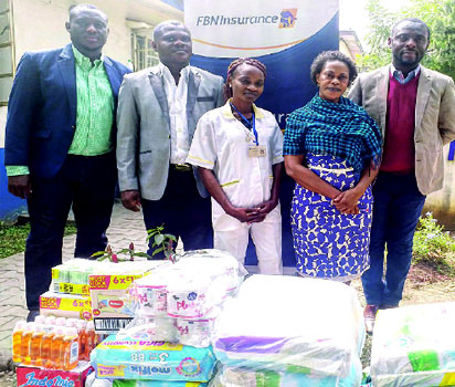 From right: Emeka Dibia, Chief Human Resources Officer, FBNInsurance; Vivian Osuntokun, Administrator; a caregiver, Heritage Homes; Raymond Akalonu, Head, Enterprise Risk Management, FBNInsurance and Olaitan Osonubi, Head, Island Region, FBNGeneral Insurance during the visit to Heritage Homes, Lagos.