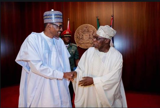 President Buhari exchanges pleasantries with former President Obasanjo, ahead of the National Council of State Meeting at the State House,