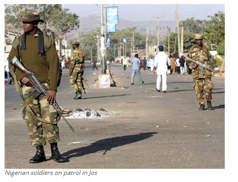 Nigerian soldiers on patrol in Jos