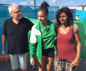 Nigeria's flag bearer in the Rhythmic Gymnastics event, Jade Faulkner, in the middle