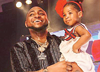 Davido and baby Imade at th Davido teaching Wizkid a lesson in fatherhood?