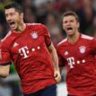 Lewandowski nets controversial penalty as Bayern make winning start