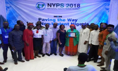 •Wife of Bauchi State Governor, Hajiya Hadiza Mohammed Abubakar, represented by the Bauchi State Commissioner for Women Affairs and Child Development, Barrister Ruqayat Ibrahim Kewa (middle displaying her award) in group photograph with some of the participants at the summit.