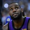 LeBron James injured in Lakers rout of defending champion Warriors
