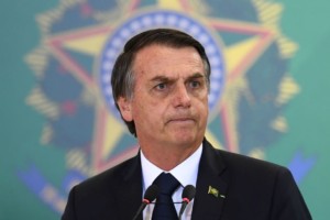 Brazil's president, Bolsonaro, threatens to cut ties with WHO
