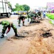 Soldiers of Onitsha cantonment embark on opening up of blocked drainages
