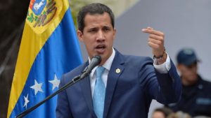 Venezuela opposition leader Guaido returns home, fighting erupts