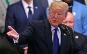Trump invokes defense powers to order GM to produce ventilators