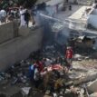 At least two survivors pulled from Pakistani airliner crash wreckage