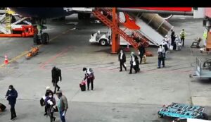 The Nigerians evacuated from UK on arrival at the MMIA, Lagos. PHOTO: Lamidi Morufu Bamidele