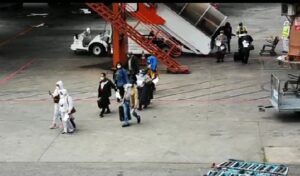The Nigerians evacuated from UK on arrival at the MMIA, Lagos. PHOTO: Lamidi Morufu Bamidele