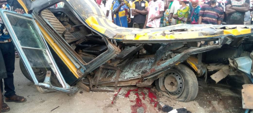 Two dead, as container-laden truck falls on bus in Lagos