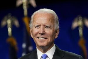 Biden, aiming at Trump, says he won’t use military as ‘prop’