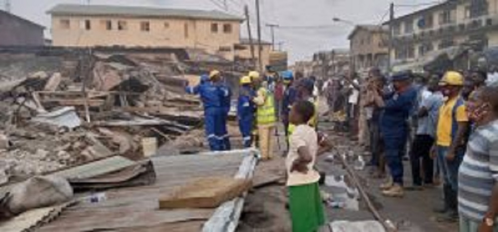 LASEMA demolishes buildings gutted by fire in Lagos
