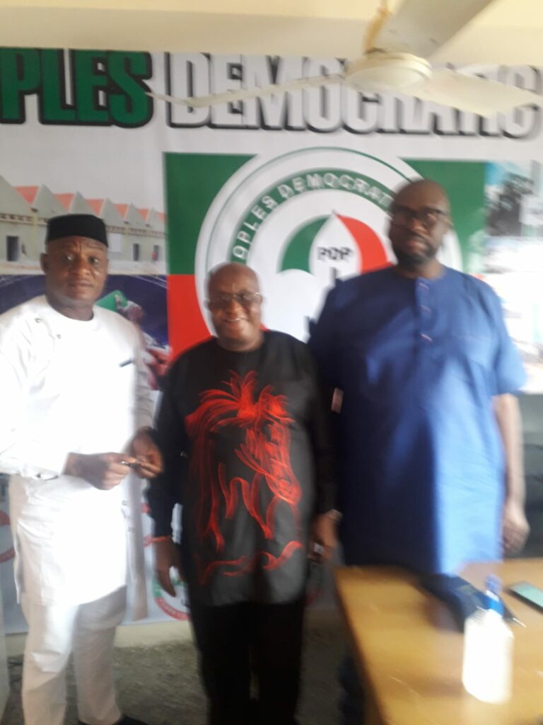 Iyoha John Darlington clad inn white with the Edo State PDP publicity secretary, Chis Nekikhare and Hon David Imafindon at the state secretariat in Benin City