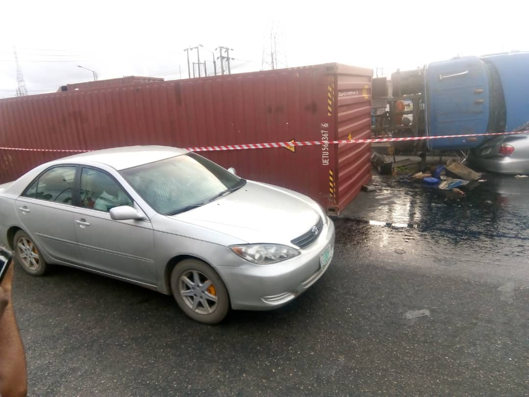 The truck and the crushed car at Cele Bus Stop, Lagos