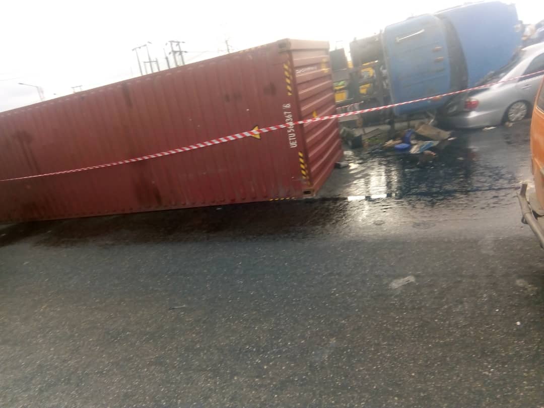 The truck and the crushed car at Cele Bus Stop, Lagos
