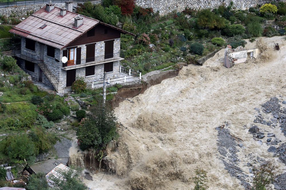 Two killed, 24 missing in severe floods in Italy and France