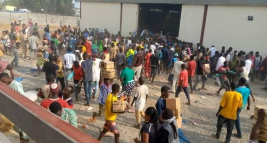 VIDEOS: Ongoing looting of warehouse in Abuja