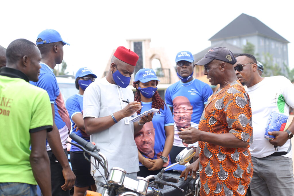 Paul Orajiaka (m) surrounded by his survey team members interviewing an elderly man in Ukpo town, Dunukofia LGA, on the challenges faced by residents in the area.